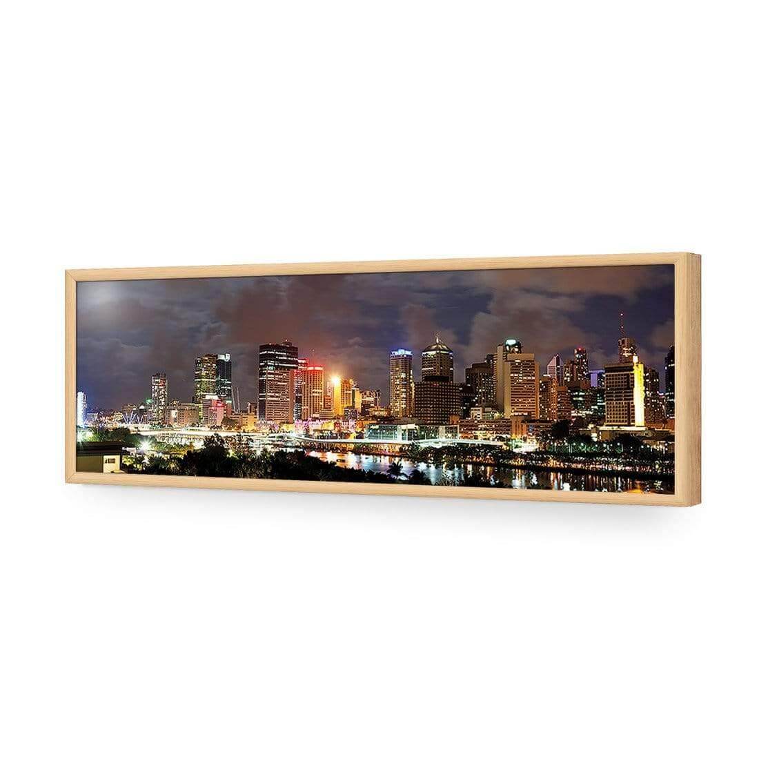 Stretched canvas wall art featuring a panoramic view of Brisbane skyline at night with vibrant city lights.