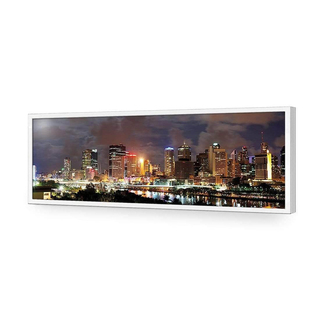 Stretched canvas wall art of Brisbane skyline at night, featuring colorful city lights and reflections in water.