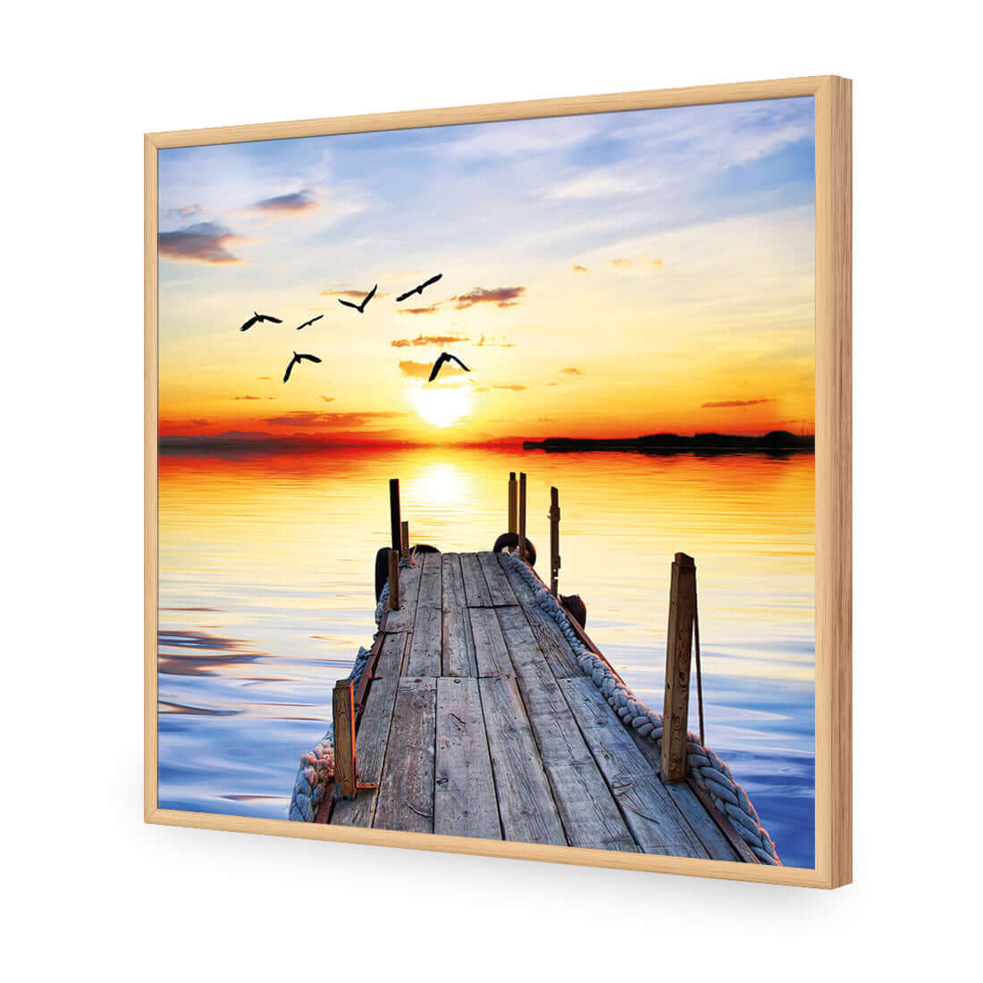 Stretched canvas art of an abandoned jetty at sunset with birds flying, showcasing tranquil waterfront beauty.