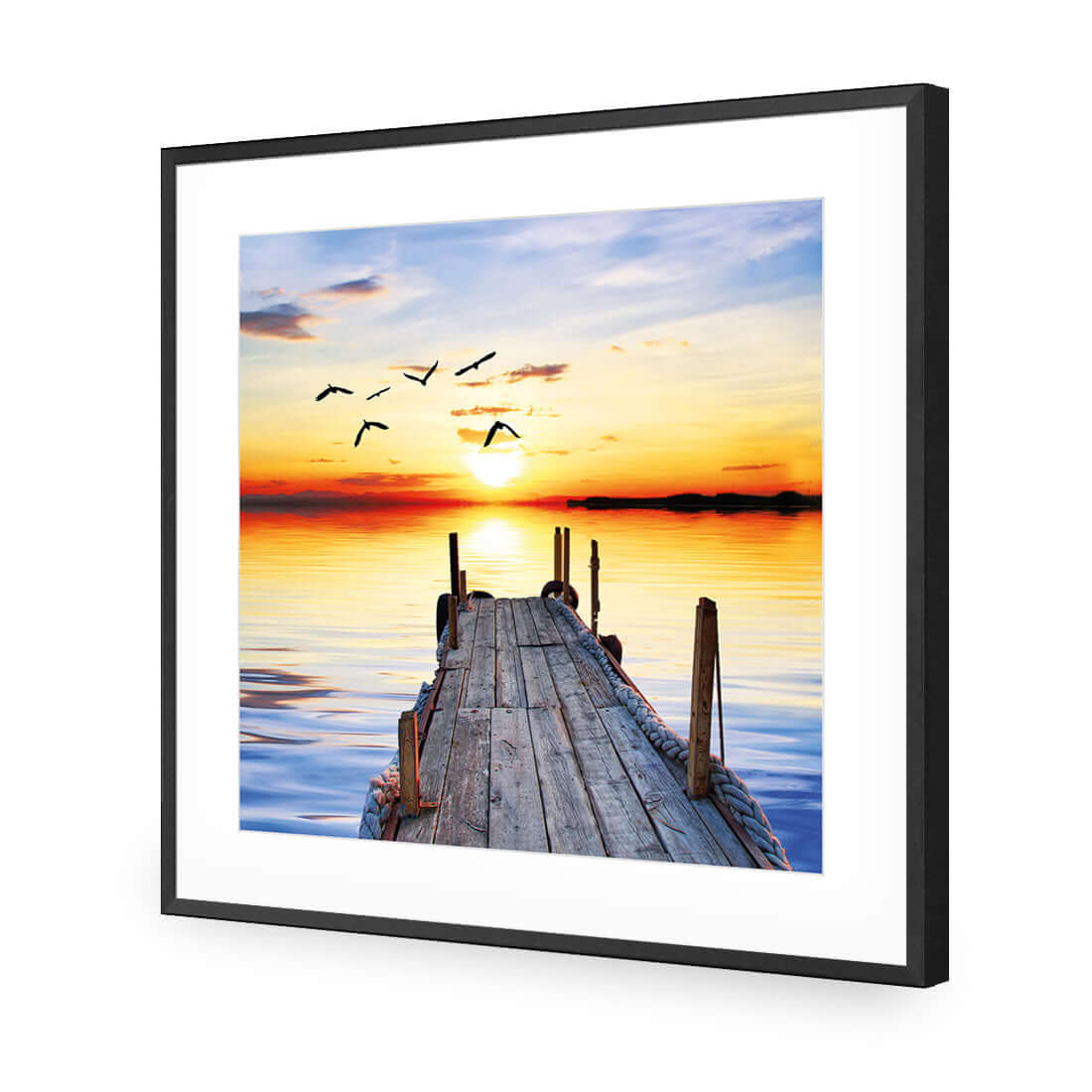 Abandoned jetty at sunset with birds flying over water, stretched canvas wall art for vibrant home decor.